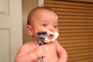 Dad photographs his premature baby doing the manliest things